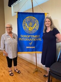 Peggy & Tami with Banner